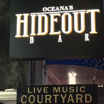 Oceanas Hideout Bar - a neon sign - Bars Near Me - New Orleans, Louisiana Oceanas Hideout Bar - a neon sign - Bars Near Me - New Orleans, Louisiana