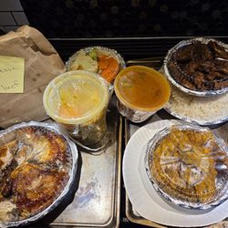 Everything we got except 1 empanada and 1 small red beans container