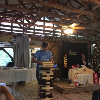 Four Paws Kingdom Campground - Sandy taking her turn at Jenga! - Campgrounds Near Me - Rutherfordton, North Carolina