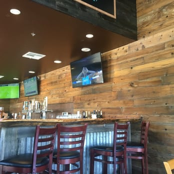 Slanted Tree Kitchen & Taproom - The bar, there are about 8-10 tables inside. - Burgers Near Me - Fairfield, California Slanted Tree Kitchen & Taproom - The bar, there are about 8-10 tables inside. - Burgers Near Me - Fairfield, California