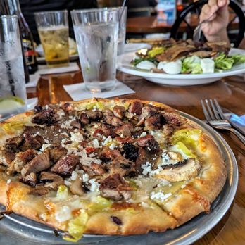 Charlie Brown's Bar & Grill - The Greek pizza - this was the smallest size, and it was quite filling for a hungry fella. - Piano Bars Near Me - Denver, Colorado Charlie Brown's Bar & Grill - The Greek pizza - this was the smallest size, and it was quite filling for a hungry fella. - Piano Bars Near Me - Denver, Colorado