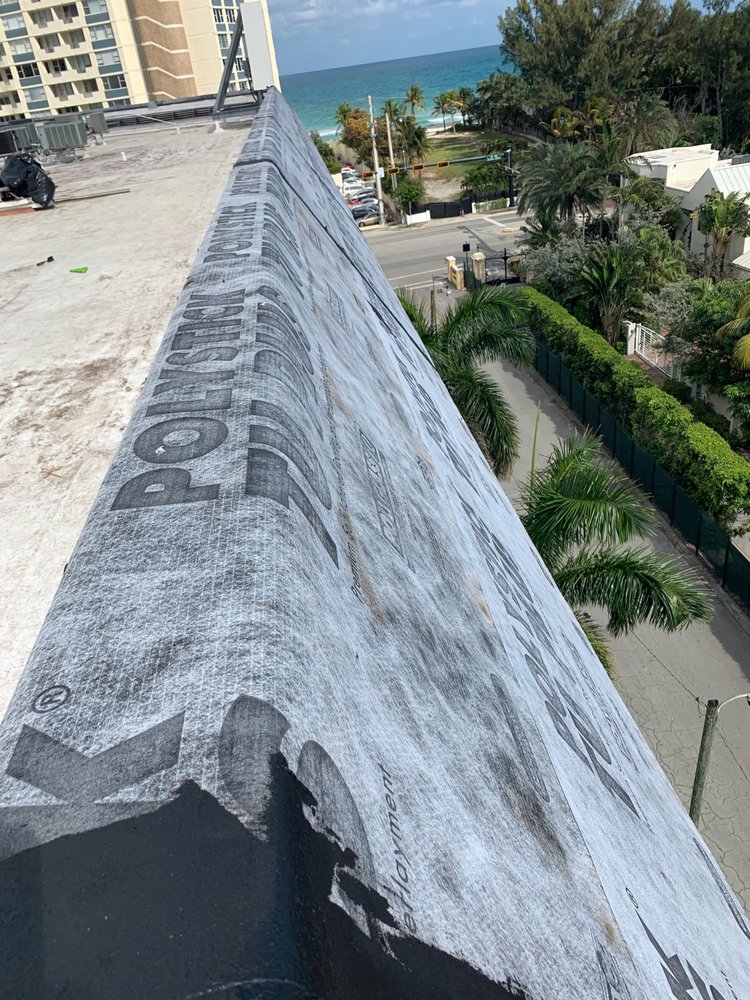 Slide of The Roof Xperts