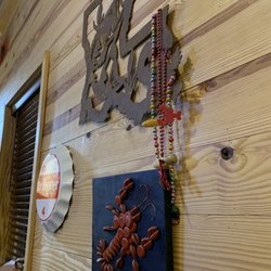 The Crawfish Shack & Drive Thru - A lot of "fun" wall decor.