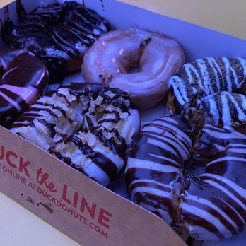 Duck Donuts - The varieties we tried... forgot the names, but the one at the top middle was the plain glazed, which in itself was amazing - Donuts Near Me - Las Vegas, Nevada