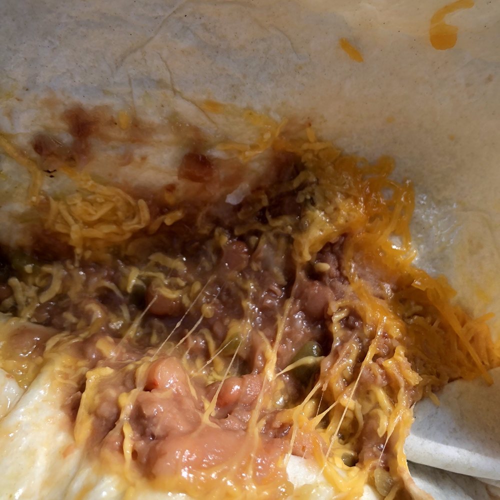 Del Taco - Inside my bean burrito. Yum! - Mexican Near Me - Folsom, California Del Taco - Inside my bean burrito. Yum! - Mexican Near Me - Folsom, California