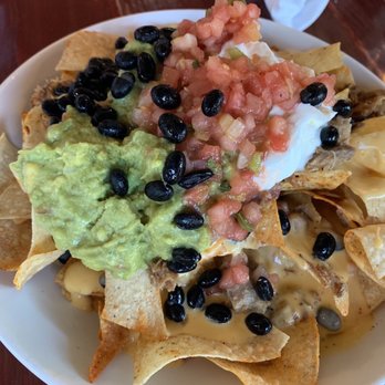 Red Tail Grill - Kahlua pig nachos - New American Near Me - Park City, Utah Red Tail Grill - Kahlua pig nachos - New American Near Me - Park City, Utah