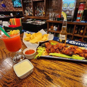 La Nueva Tequilas - a platter of chicken wings and chips - Mexican Near Me - Gonzales, Louisiana La Nueva Tequilas - a platter of chicken wings and chips - Mexican Near Me - Gonzales, Louisiana