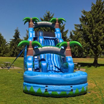 Topsy Turvy Bouncers - What better way to cool off during the summer heat than with our 18ft Blue Crush Water Slide! - Party & Event Planning Near Me - Auburn, Washington Topsy Turvy Bouncers - What better way to cool off during the summer heat than with our 18ft Blue Crush Water Slide! - Party & Event Planning Near Me - Auburn, Washington