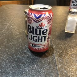 Chase’s Riverside Dining - Beer served in cans - it's at a golf course