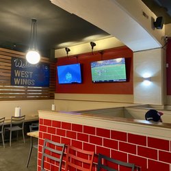 Main dining area with four TVs