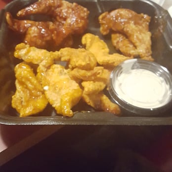 Emma's Pub & Pizza - Imagine the shock when I saw the size of this boneless wing platter. This is what I took home! - Pizza Near Me - Bridgewater, Massachusetts Emma's Pub & Pizza - Imagine the shock when I saw the size of this boneless wing platter. This is what I took home! - Pizza Near Me - Bridgewater, Massachusetts