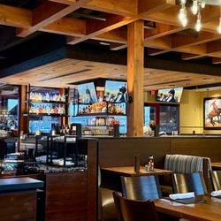 Lazy Dog Restaurant & Bar - Dining area and bar view from our booth
