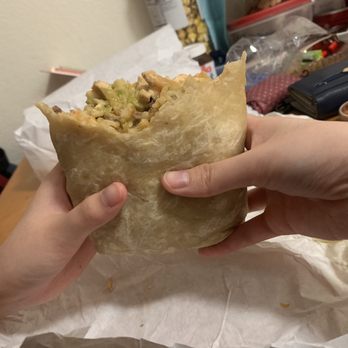 Cali Tacos - My cousin was already full and she ate less than 1/4 of the angel burrito - Mexican Near Me - Orange, California