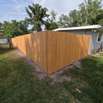 Dan The Landscapin' Man - New, custom built fence after installation. - Landscaping Near Me - Jacksonville, Florida Dan The Landscapin' Man - New, custom built fence after installation. - Landscaping Near Me - Jacksonville, Florida