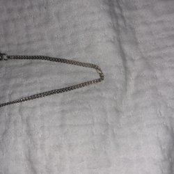 Raquel's Jewelry - Repair of silver chain. They fused 5 links.