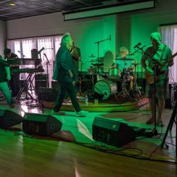 Charleston Rifle Club - JP and the Moonshine Boys. John Price is the main singer who invited me. Female singer is great, as is the group.