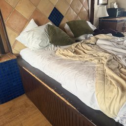 Chipped wooden planks to cross getting in and out of bed Chipped wooden planks to cross getting in and out of bed