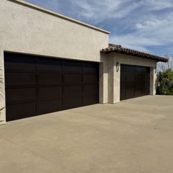 The Painting Company - Restrained garage doors