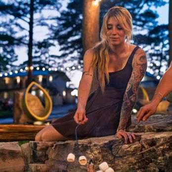 Forest Springs Resort - Gather around the fire pit for a fun evening of roasting marshmallows. - Resorts Near Me - Eureka Springs, Arkansas Forest Springs Resort - Gather around the fire pit for a fun evening of roasting marshmallows. - Resorts Near Me - Eureka Springs, Arkansas