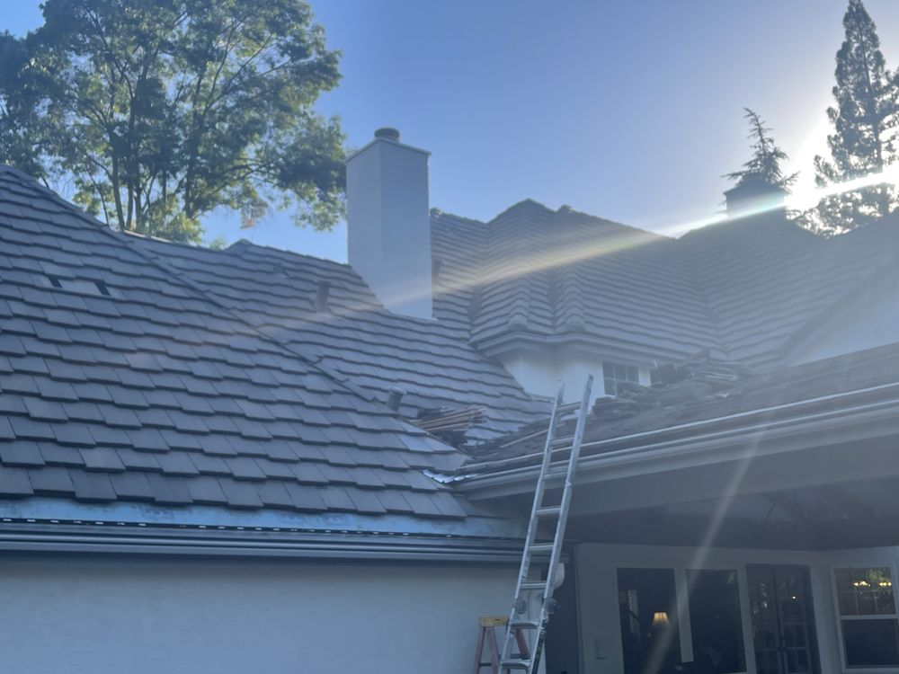 Slide of Noriega Roofing