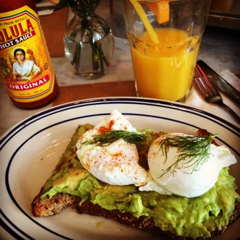 The Corner - A-mazingly perfect poached eggs over avocado toast . I substituted whole grain bread for the rustic toast which is equally amazing . Yummy! - Cafes Near Me - Montclair, New Jersey