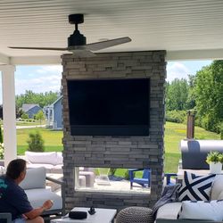 Fisher Custom AV - We offer custom outdoor TV and soundbar installation including above outdoor fireplaces.
