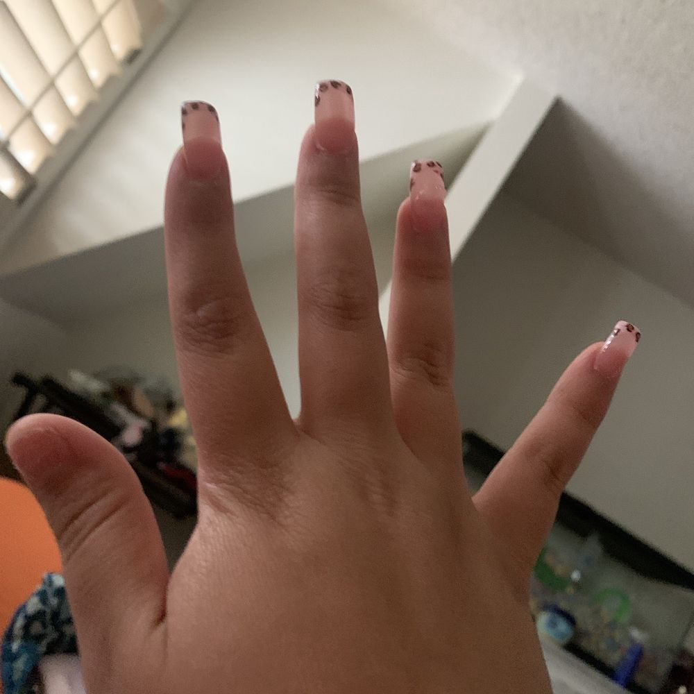 Super Nails - Supposed to be a bow on the ring finger and I had to tear off my thumb nail since it broke and could hurt my son - Nail Salons Near Me - Richland, Washington
