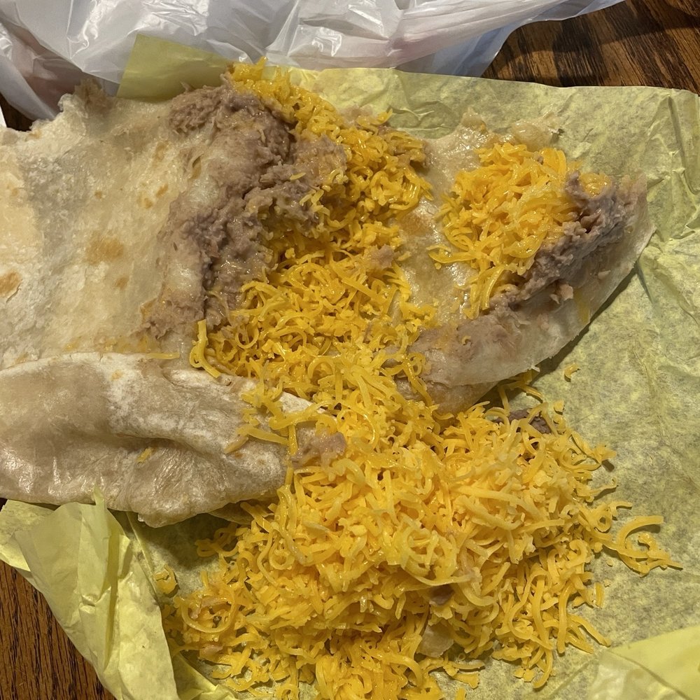 All cheese in the bean and cheese burrito. All cheese in the bean and cheese burrito.