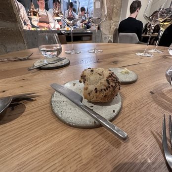 Auberge Nicolas Flamel - Daily house churned butter with seeded bread - French Near Me - Paris, 75 Auberge Nicolas Flamel - Daily house churned butter with seeded bread - French Near Me - Paris, 75