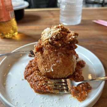 Cotto E Crudo - Arancini with bolognese sauce - Italian Near Me - Houston, Texas Cotto E Crudo - Arancini with bolognese sauce - Italian Near Me - Houston, Texas