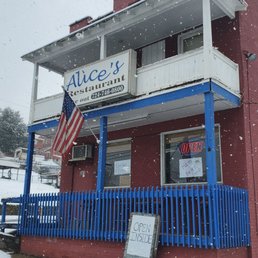 a red building with blue railings