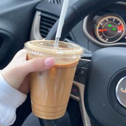 Iced oat milk latte with an extra shot of espresso