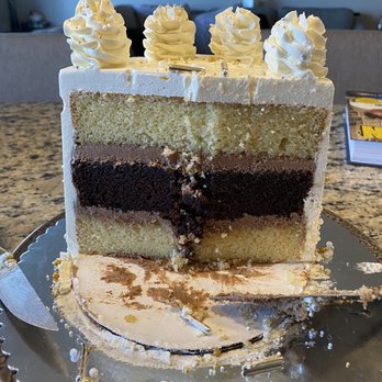 My Sweet Monsters - Three layer vanilla/chocolate gluten free cake with buttercream icing and metallic sprinkles (inside) - Custom Cakes Near Me My Sweet Monsters - Three layer vanilla/chocolate gluten free cake with buttercream icing and metallic sprinkles (inside) - Custom Cakes Near Me