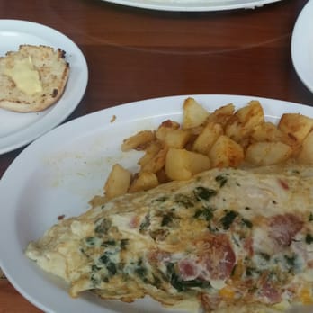 Derry's Restaurant - Egg white omlette with spinach turkey bacon onions cheddar cheese. Side of biscuit and a pancake - Breakfast & Brunch Near Me - Hollywood, Florida Derry's Restaurant - Egg white omlette with spinach turkey bacon onions cheddar cheese. Side of biscuit and a pancake - Breakfast & Brunch Near Me - Hollywood, Florida