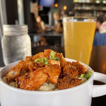 Smith & Kings - a bowl of food and a glass of beer - Cocktail Bars Near Me - Honolulu, Hawaii