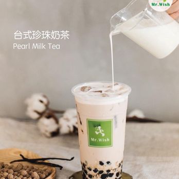Mr Wish - a person pouring milk into a cup - Bubble Tea Near Me - Philadelphia, Pennsylvania Mr Wish - a person pouring milk into a cup - Bubble Tea Near Me - Philadelphia, Pennsylvania