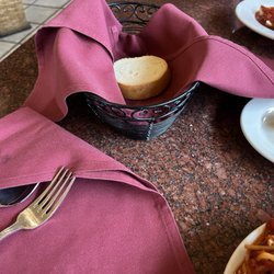 Pasquale’s Italian Restaurant - One piece of bread in a basket