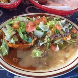 Wagon Wheel Saloon - Full chili burger. With half n half. Half red chili, half green chili. Delicious!