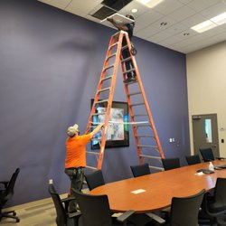 The Brass Effect - Up on a tall ladder to replace an access point.