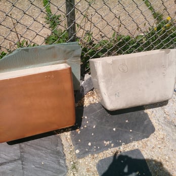 The Loading Dock - Garden planters their former life water tanks for toilets, now planters. Actually, found three in the free pile outside. - Building Supplies Near Me - Baltimore, Maryland