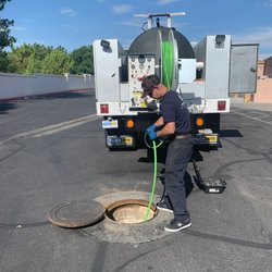 BC Plumbing - Hydro jetting a sewer from a manhole at a large industrial complex