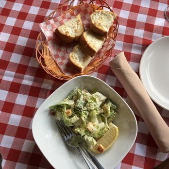 Uncle Tony's - Caesar Salad and garlic bread - Italian Near Me - Toronto, Ontario Uncle Tony's - Caesar Salad and garlic bread - Italian Near Me - Toronto, Ontario