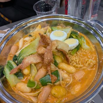 Dookki - Regular, cheese and corn cheese tteokbokki in rosé sauce with bok choy, green onion, cabbage and enoki mushrooms with sausage - Korean Near Me - Fullerton, California
