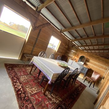 Woodbine Vineyard - a dining room with a table and chairs - Wineries Near Me - Buffalo Junction, Virginia Woodbine Vineyard - a dining room with a table and chairs - Wineries Near Me - Buffalo Junction, Virginia