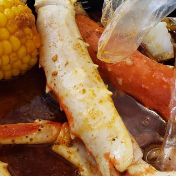 Volcano Crab - 1Lb King Crab & 1/2 Green Mussel Cooked Cajun with Spicy Level - Seafood Near Me - Colonial Heights, Virginia Volcano Crab - 1Lb King Crab & 1/2 Green Mussel Cooked Cajun with Spicy Level - Seafood Near Me - Colonial Heights, Virginia