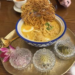 Khao Soi - delicious creamy coconut curry noodle dish from the North region Khao Soi - delicious creamy coconut curry noodle dish from the North region