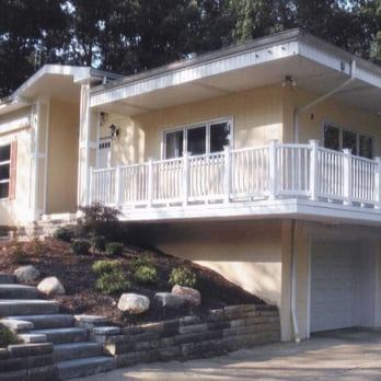Precision Siding & Construction - a home with a balcony - General Contractors Near Me - Akron, Ohio Precision Siding & Construction - a home with a balcony - General Contractors Near Me - Akron, Ohio