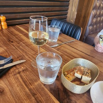 Saltyard - Central Coast Riesling, Homemade Focaccia. - New American Near Me - Burlingame, California Saltyard - Central Coast Riesling, Homemade Focaccia. - New American Near Me - Burlingame, California