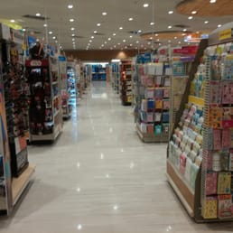 a store aisle with a variety of products a store aisle with a variety of products