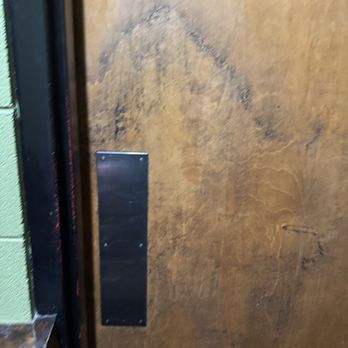 Fuddruckers - Filthy door to restroom - Burgers Near Me - Sevierville, Tennessee
